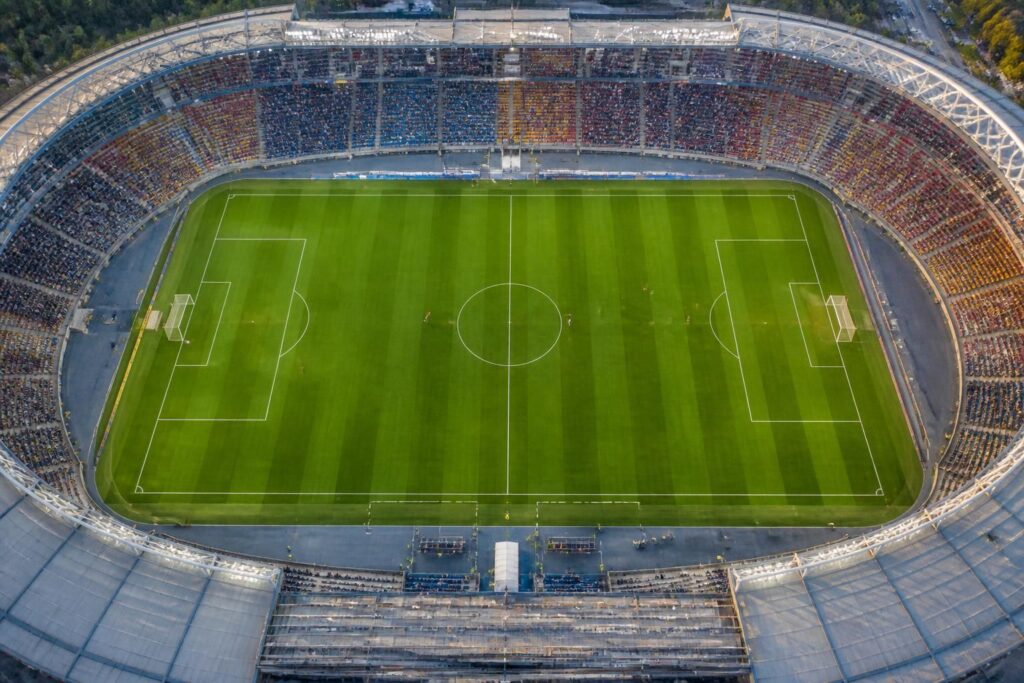 découvrez les dimensions standards d'un stade de football et les variations possibles selon les compétitions internationales et régionales.